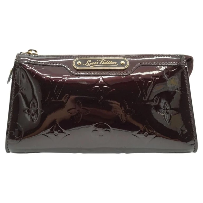 Louis Vuitton — Louis Vuitton Amarante Trousse Cosmetique Pouch — Designer Shoe — resale