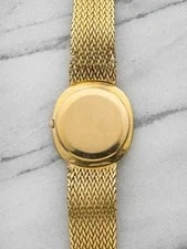 1970s Patek Philippe Ellipse 3589/1 18K YG Red Sunburst Dial Auto 33mm 3