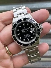 Rolex — Rolex Submariner Date 40mm 16610 Box and Papers & Service Card — Watch — resale