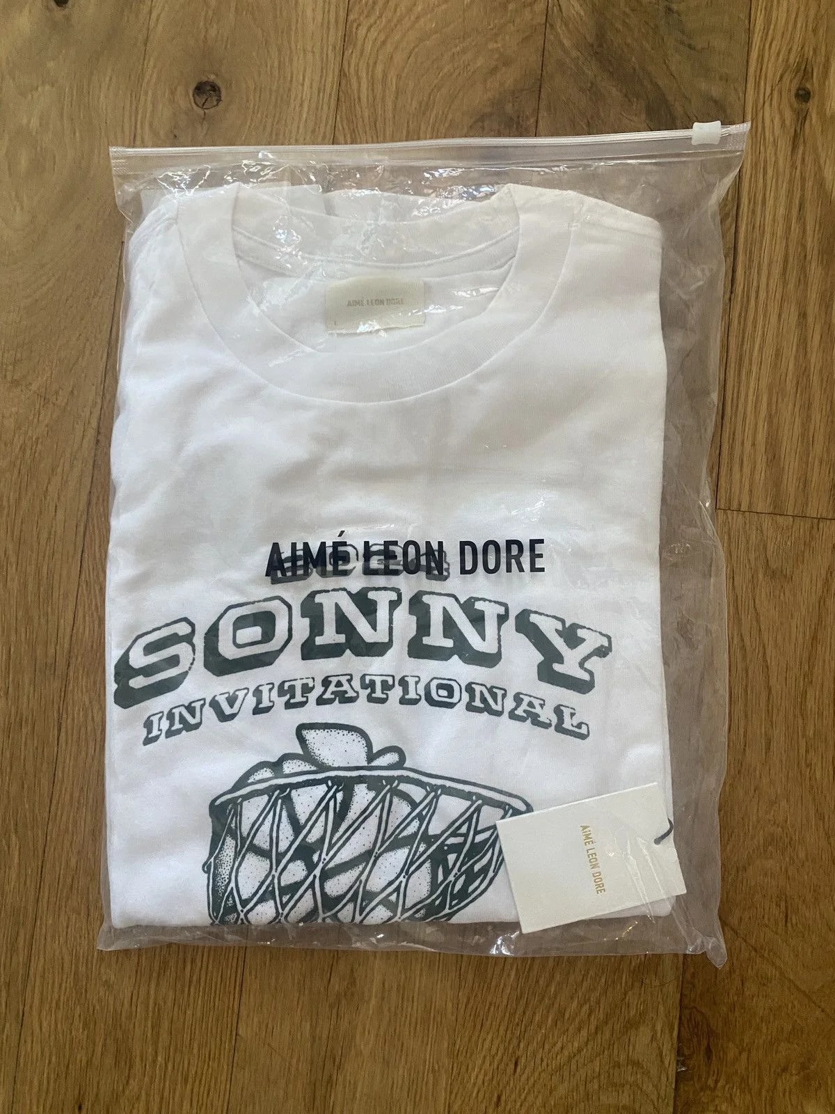 New Balance — Aime Leon Dore / New Balance Sonny NY Paris Invitational Tee — streetwear — resale