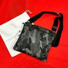 Prada — Good Condition Prada Triangle Logo Camouflage Pattern le — Handbag — resale