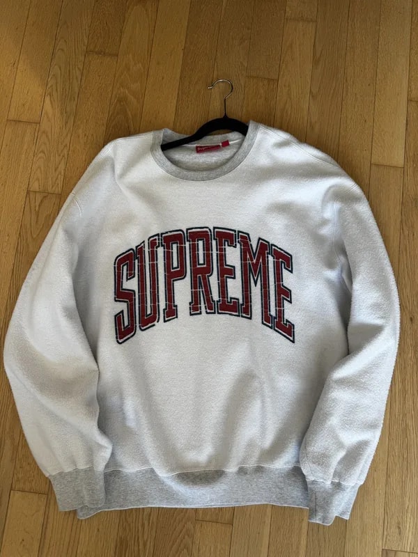Supreme — Supreme Plaid Arc Logo Crewneck — streetwear — resale