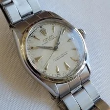 Rolex — Rolex Oyster Perpetual Ref 6084 34mm 1950s Automatic Bubble Back RA715 — Watch — resale