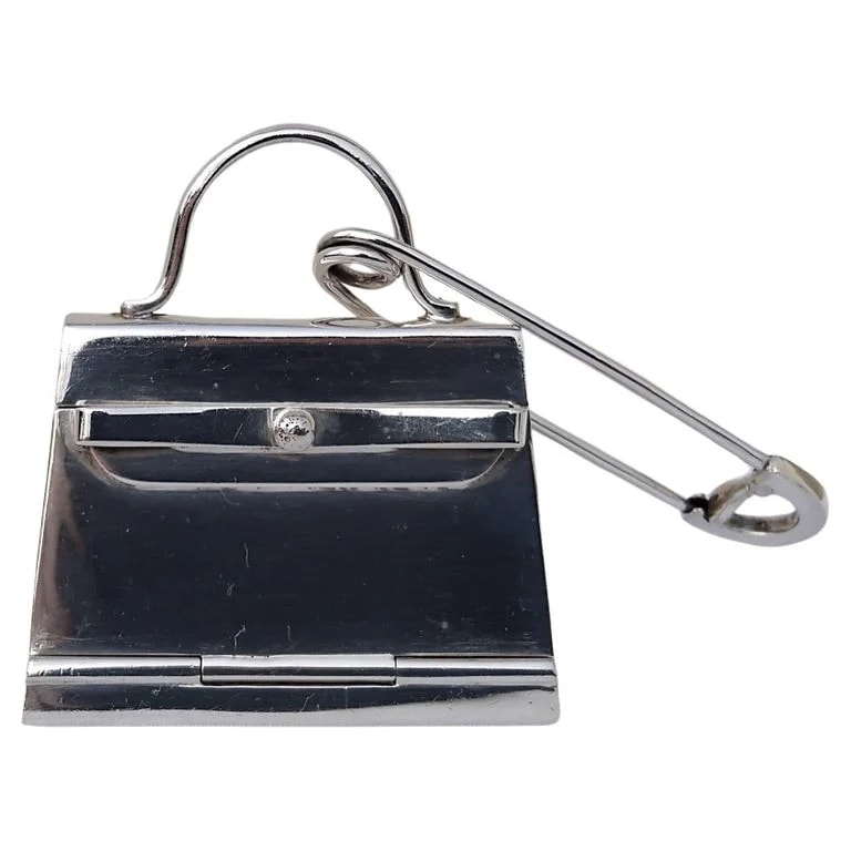 Hermès — Hermès Smallest Kelly Pill and Its Safety Pin — Handbag — resale