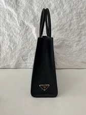 Authentic Prada Embossed Logo 4