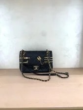 Chanel — Chanel Classic Flap Crossbody Large Cruise — Handbag — resale