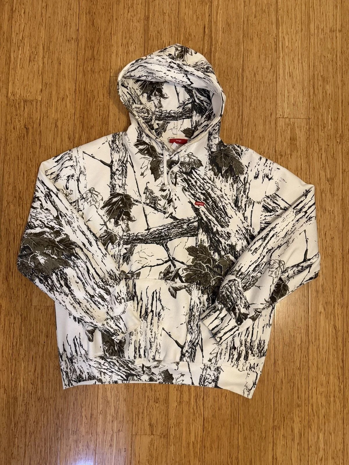 Supreme — Supreme Camo Hoodie — streetwear — resale