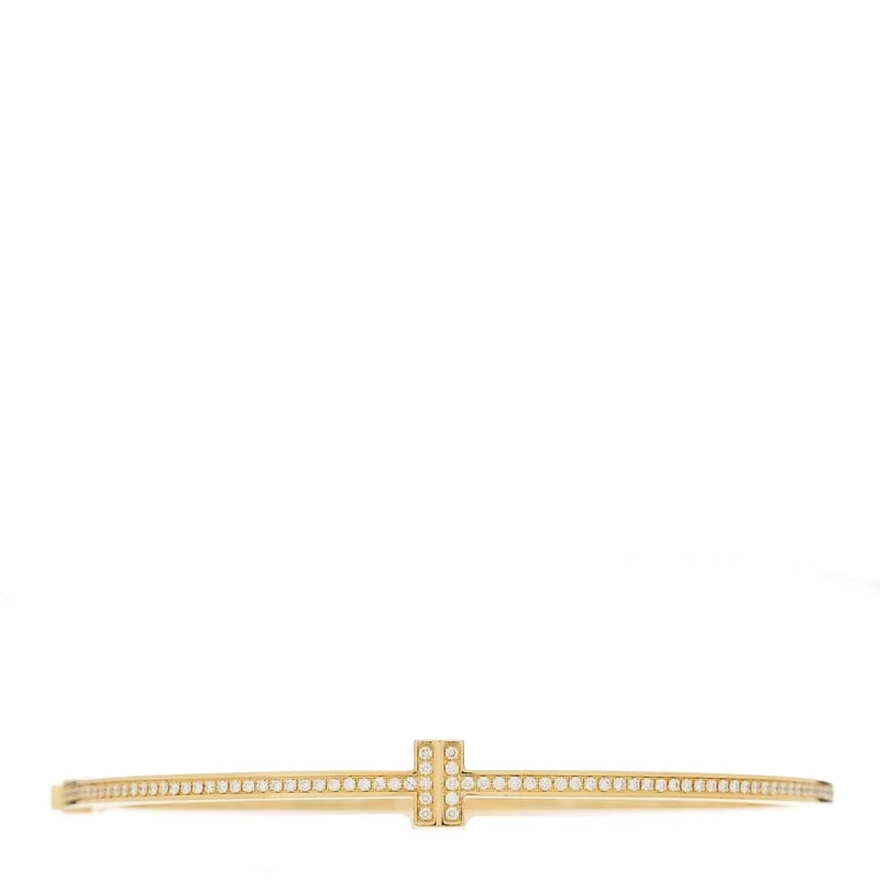 Tiffany & Co. — 18K Yellow Gold T Hinged Wire Bangle — Jewelry — resale