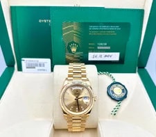 Rolex — 2024 Rolex President Day Date 36 128238 Champagne Baguette Diamond Dial 18K Gold — Watch — resale