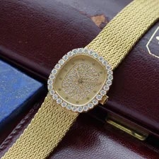 Patek Philippe — Patek Philippe Diamond Pave Ellipse Bracelet 4134/910 18k Gold Box Papers 1980s — Watch — resale
