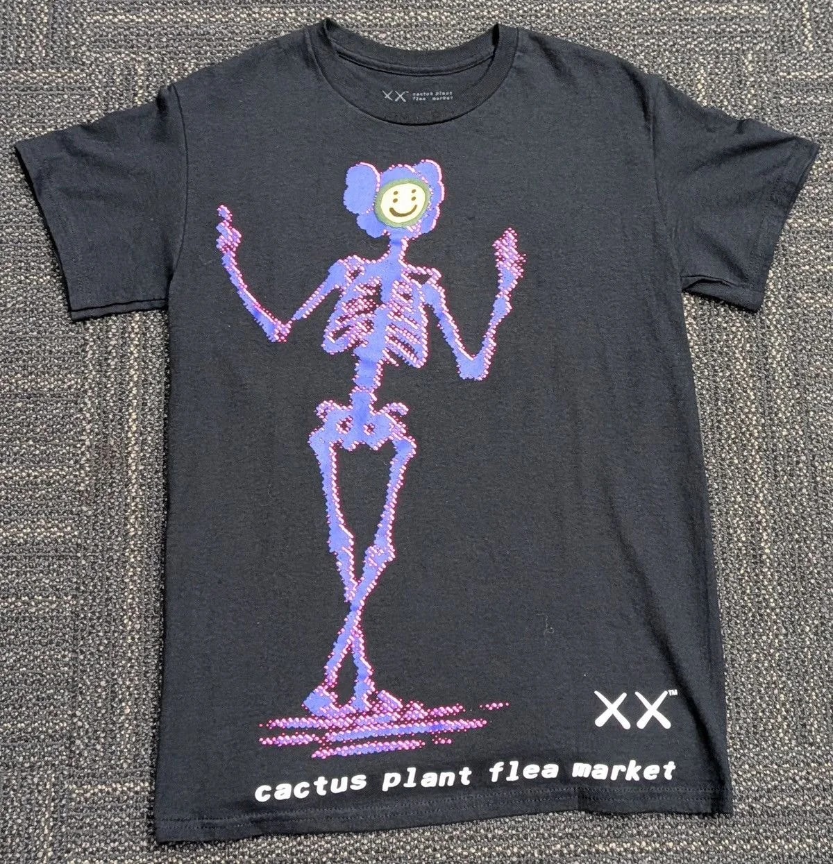 KAWS — Kaws Cpfm Tee — streetwear — resale
