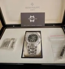 Patek Philippe — Patek Philippe Nautilus Ref. 5990/1400G-001 • Full Set • Dated 08/23 — Watch — resale