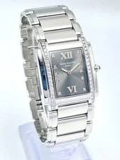 Patek Philippe — Patek Philippe 25mm Twenty 4 Quartz Steel Factory Diamond 4910/10A-0110 Papers — Watch — resale