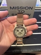 Swatch X Omega — Swatch X Omega Bioceramic Moonswatch Mission To Saturn 42 Mm Beige... — Watch — resale