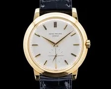 Patek Philippe — Patek Philippe 2552 Calatrava "Disco Volante" 18K YG Silver Dial Circa. 1958 — Watch — resale