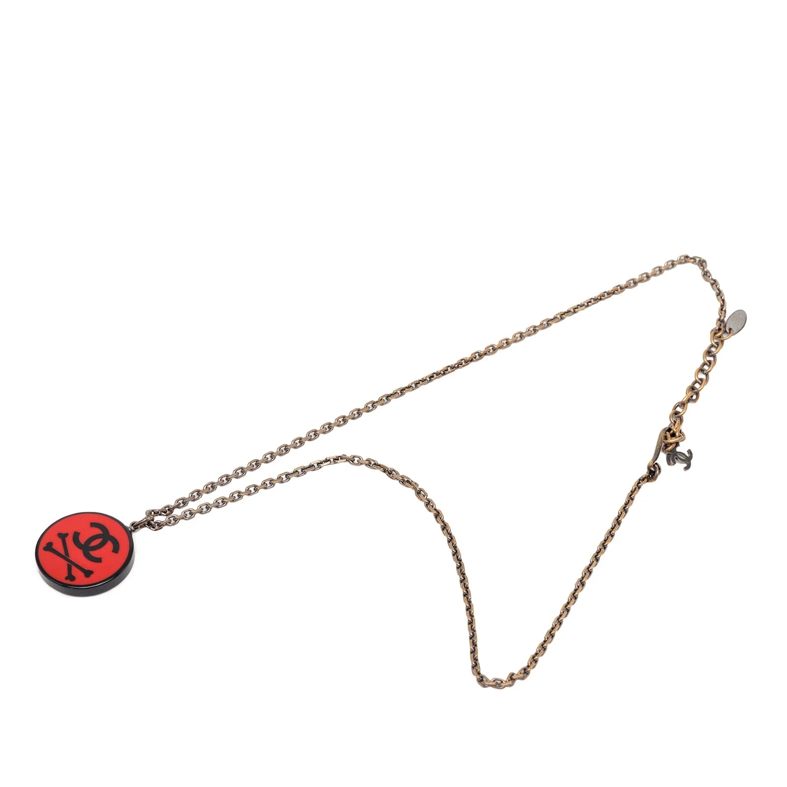 Chanel — CC Resin Crossbones Round — Jewelry — resale