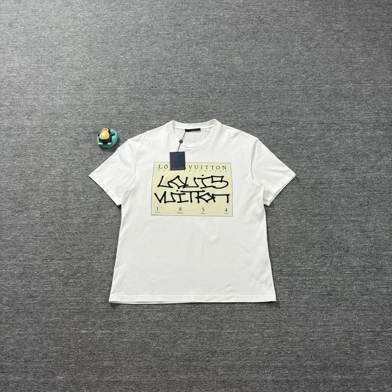 Louis Vuitton — Louis Vuitton Handle With Care Graffiti T-Shirt — streetwear — resale