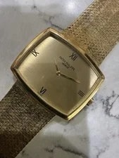 Patek Philippe — Patek Philippe 3528 18K Yellow Gold Cushion Manual Wind Roman Dial Bracelet — Watch — resale