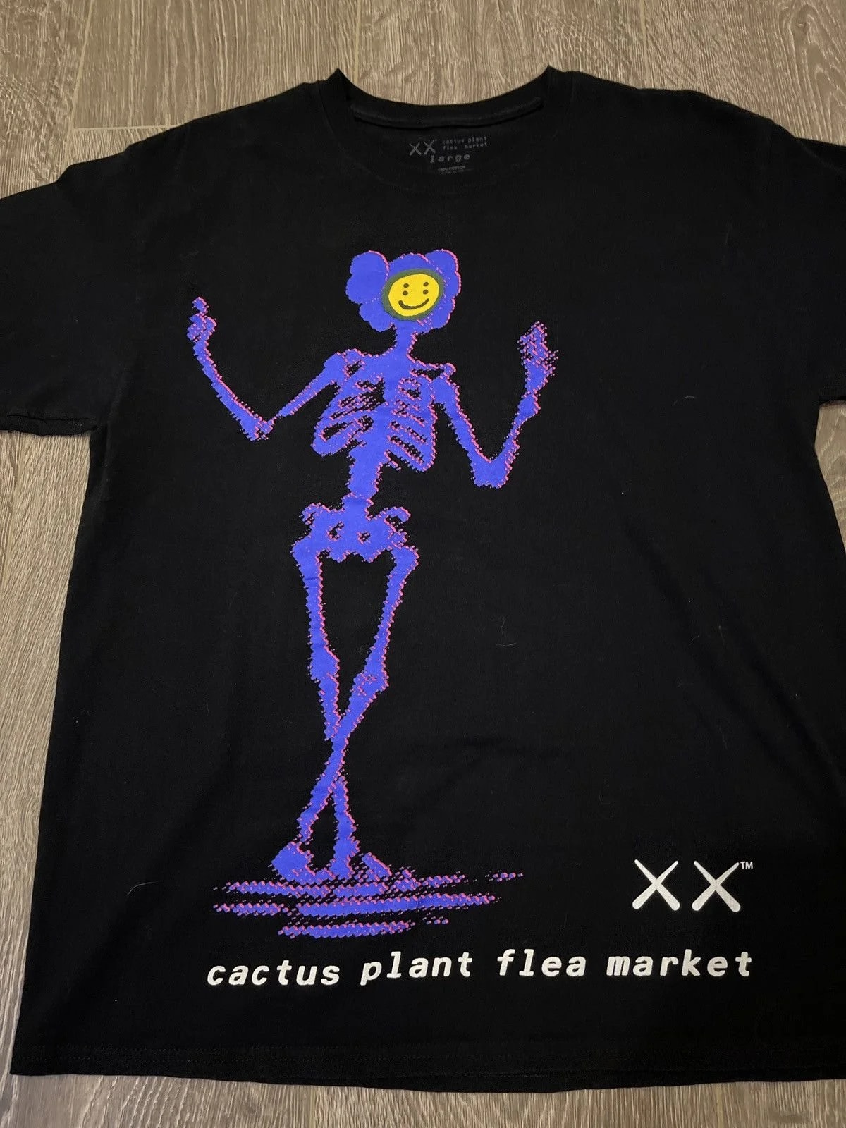 KAWS — Cpfm and Kaws Tee — streetwear — resale