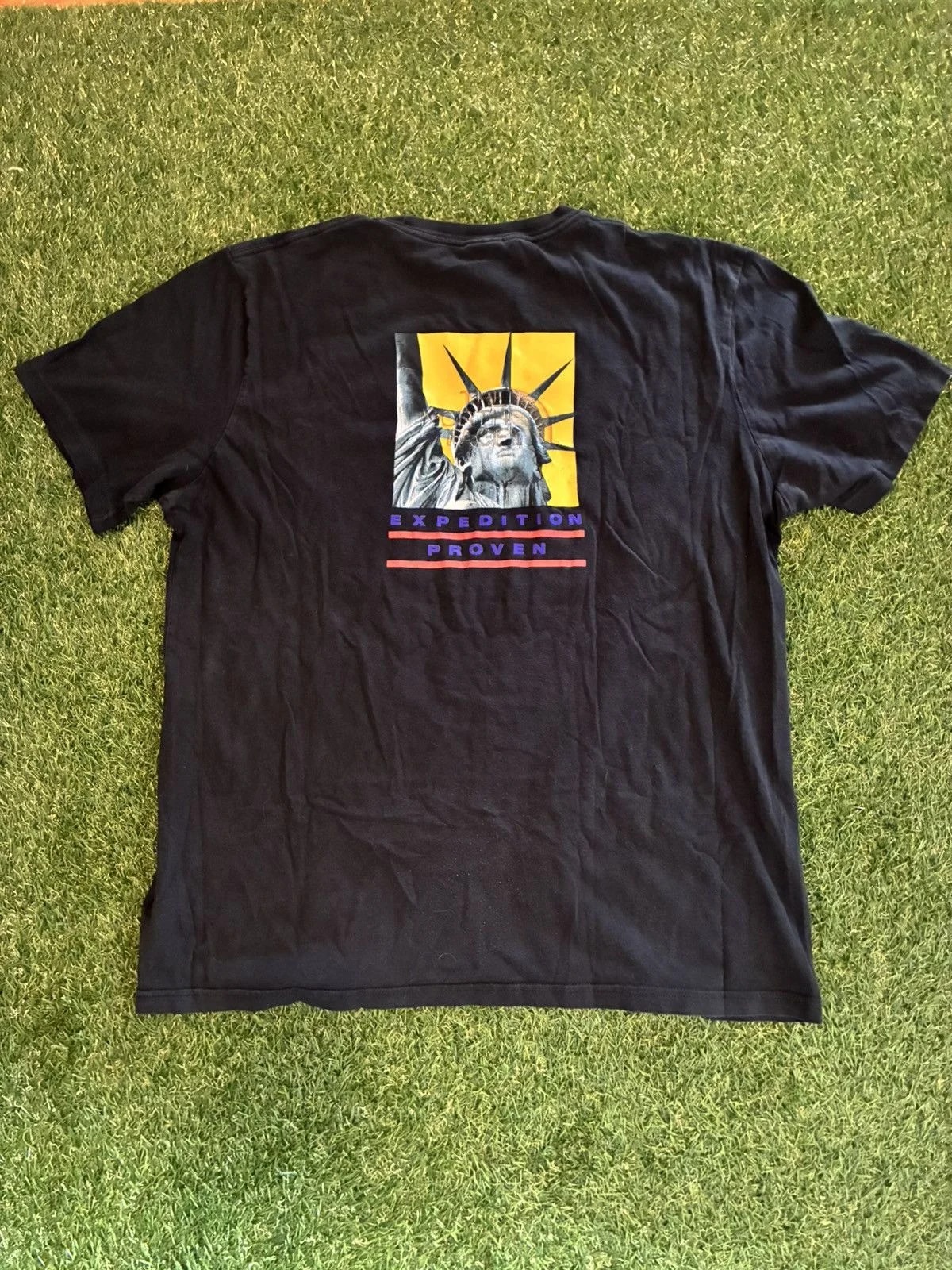 Supreme — Supreme X TNF Statue of Liberty Tee — streetwear — resale