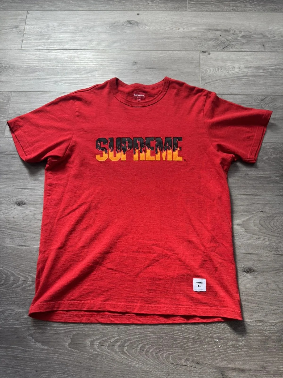 Supreme — Supreme Fire Tee — streetwear — resale