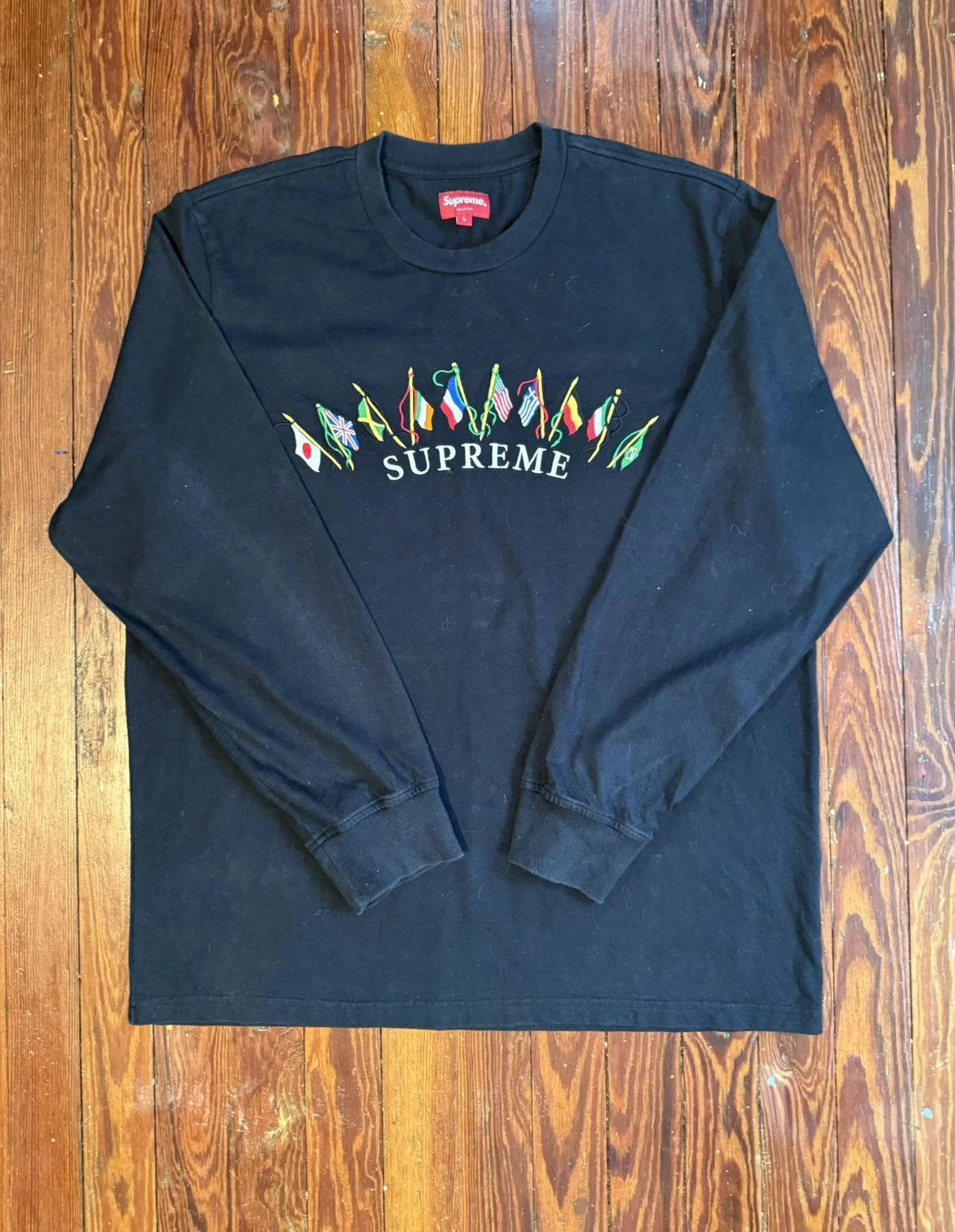 Supreme — Supreme Flags L/S Top — streetwear — resale