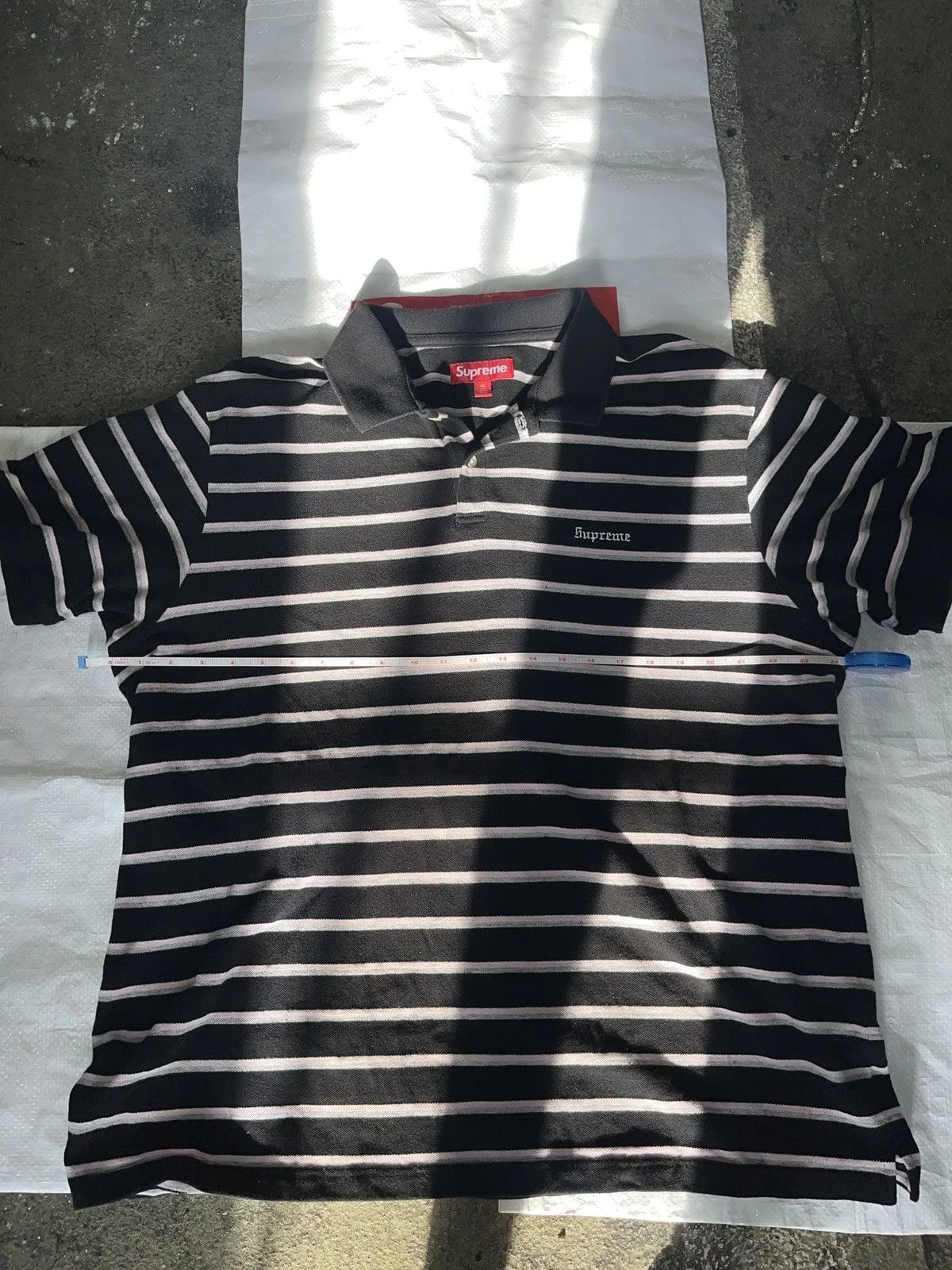 Supreme — Supreme Washed Stripe Polo — streetwear — resale