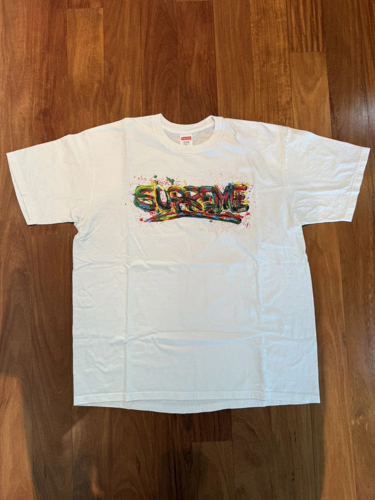 Supreme — Supreme Paint Logo T-Shirt — — streetwear — resale