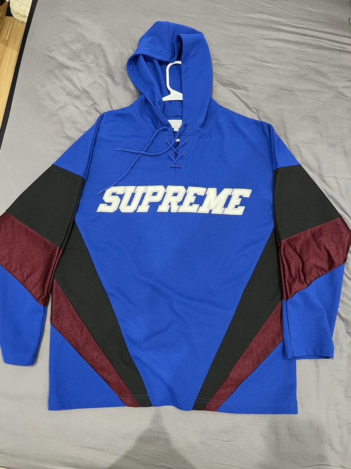 Supreme — Supreme Hooded Hockey Hoodie — streetwear — resale
