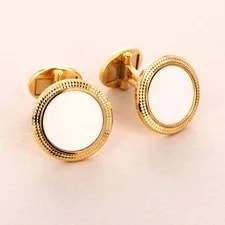 Patek Philippe — Patek Philippe Yellow Gold and White Enamel Cufflinks (Objet) — Watch — resale
