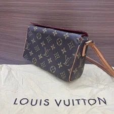 Authentic Louis Vuitton Gaston Wearable Wallet in AG Certified 4