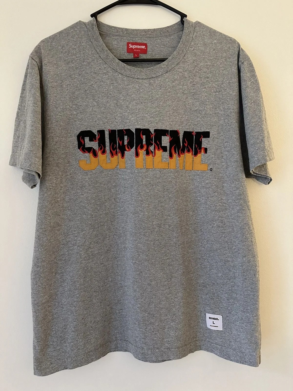 Supreme — Supreme Flames S/S Top Tee — streetwear — resale