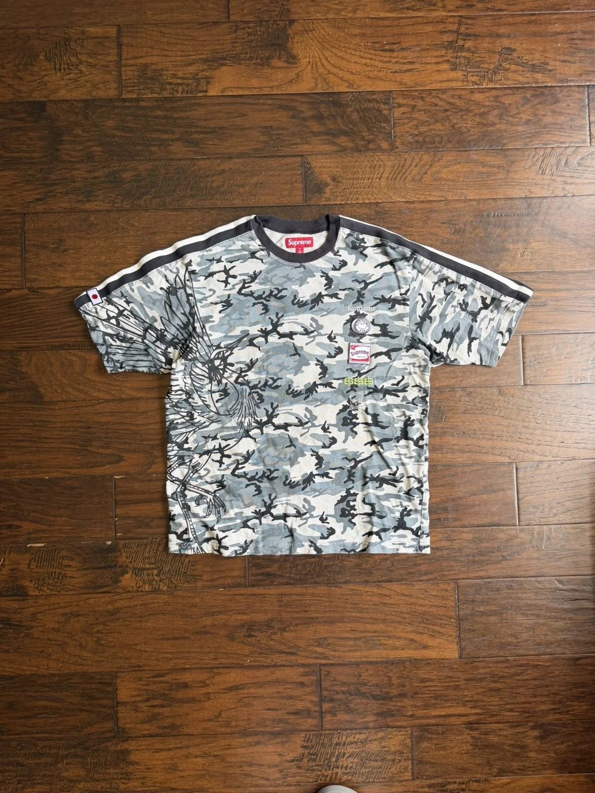 Supreme — Supreme Crane Short-Sleeve Top “ Camo” — streetwear — resale