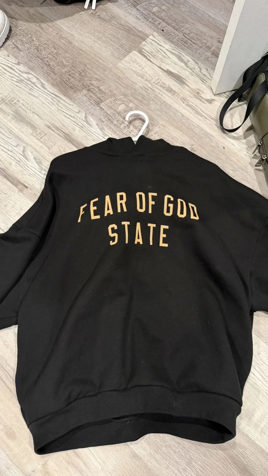 Fear of God — Fear of God Writing Hoodie — streetwear — resale