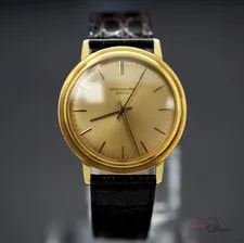 Patek Philippe — Patek Philippe 3569 Calatrava 18K YG - 35 Mm W/ Champagne Dial #X29 — Watch — resale