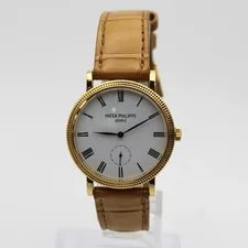 Patek Philippe — Patek Philippe Calatrava 31mm 18k Yellow Gold White Dial 7119J-010 — Watch — resale