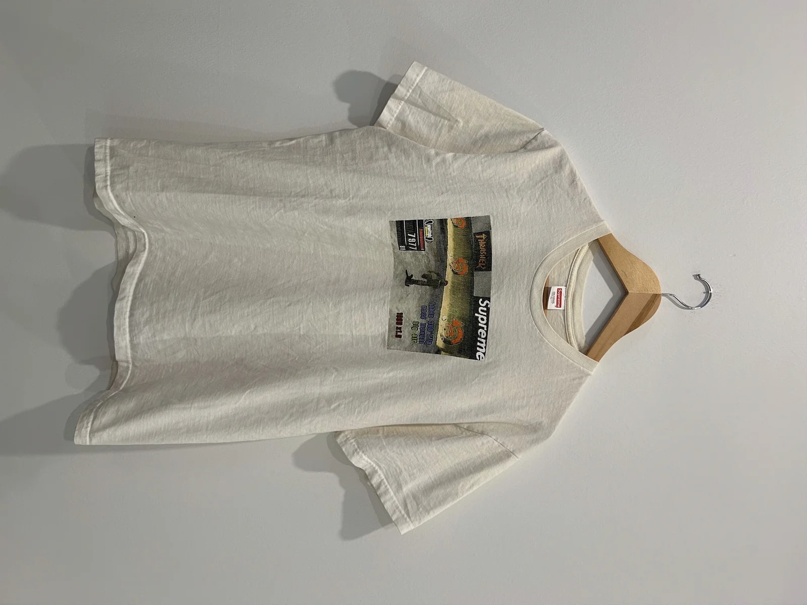 Supreme — Supreme X Thrasher Video Game Tee — streetwear — resale