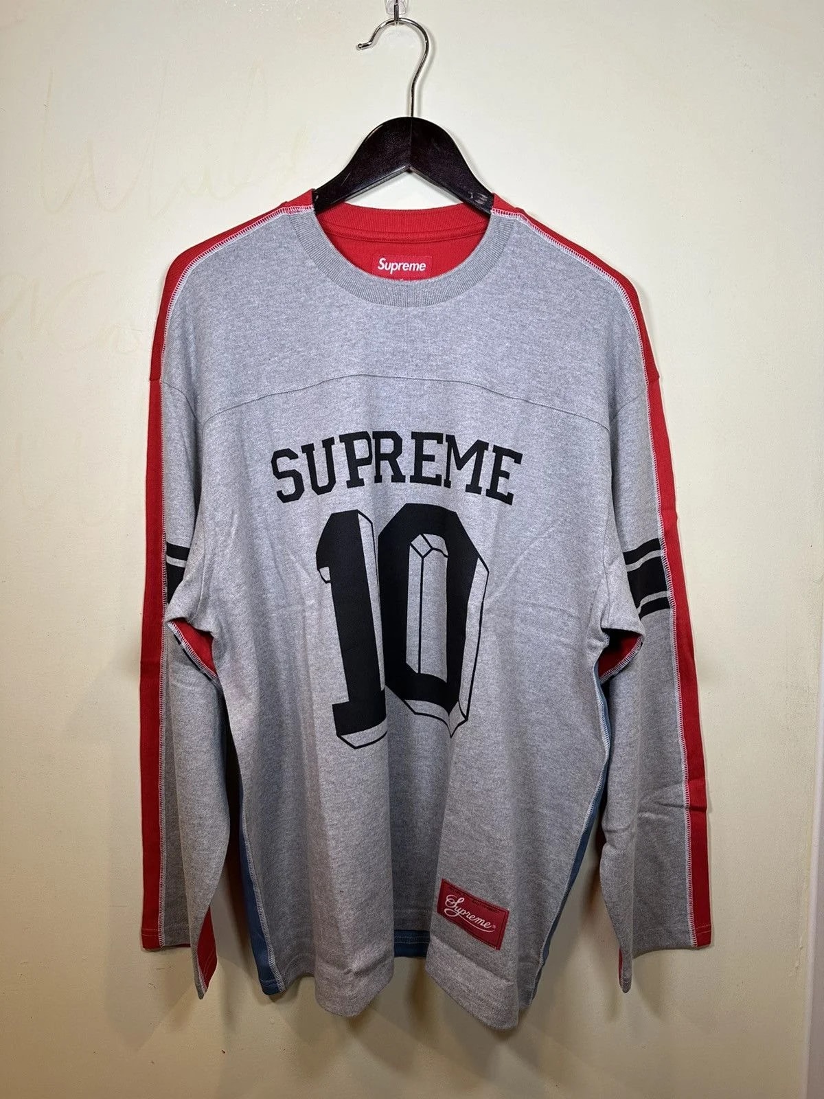 Supreme — Supreme Split L/S Football Top — streetwear — resale