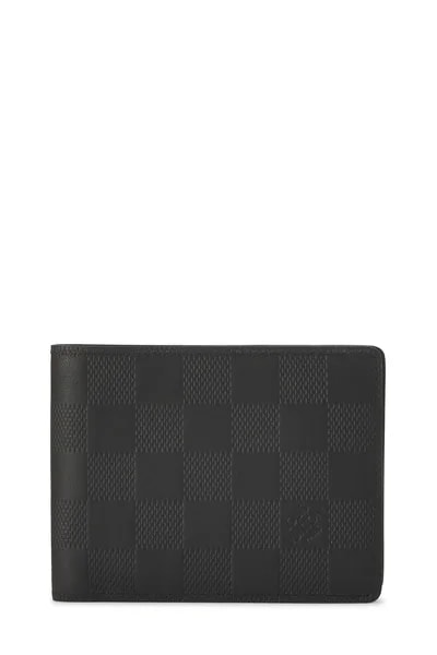 Louis Vuitton — Infini Multiple Wallet — Accessory — resale