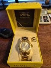 Invicta — Invicta Diver Gold-Tone Automatic 300m Date Exhibition Caseback. — Watch — resale