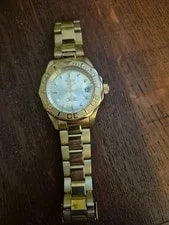 Invicta Diver Gold-Tone Automatic 300m Date Exhibition Caseback. 3