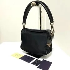 Prada — Prada Archive Logo Plate Excellent — Handbag — resale