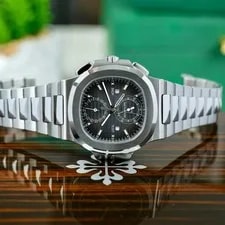Patek Philippe — Patek Philippe Nautilus 5990-1A-001 Stainless Steel Travel Time Complete Set — Watch — resale