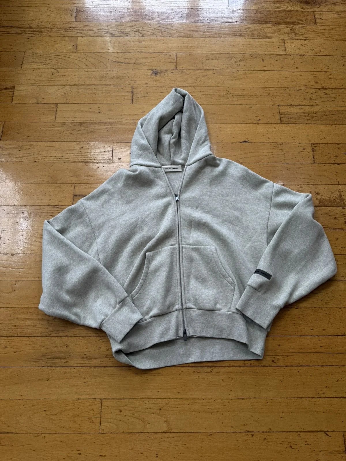 Fear of God Essentials — Fear of God Essentials Zip Up Hoodie — streetwear — resale