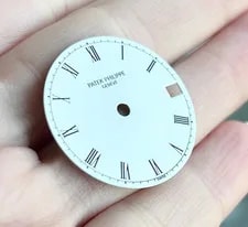 A Patek Philippe Dial and Case. 18k Gold. 4