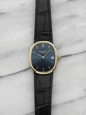 Patek Philippe — 1970s Patek Philippe Ellipse 3788 18k Yellow Gold Blue Dial Quartz 28mm — Watch — resale