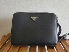 Prada — Prada Triangle Logo Backpack Mini 2VZ038 — Handbag — resale