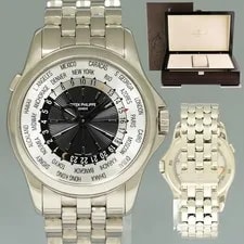 Patek Philippe — Patek Philippe 5130/1g 39mm White Gold Bracelet Blue World Time Box — Watch — resale