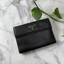 Prada — Prada Compact Wallet With Triangle Plate in . — Handbag — resale