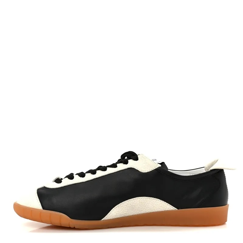 Chanel — Embossed Sneakers 40 — Sneaker — resale
